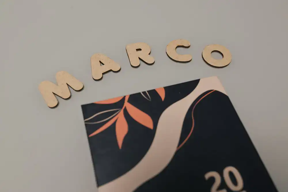 Custom wooden name puzzle in soft natural wood tones