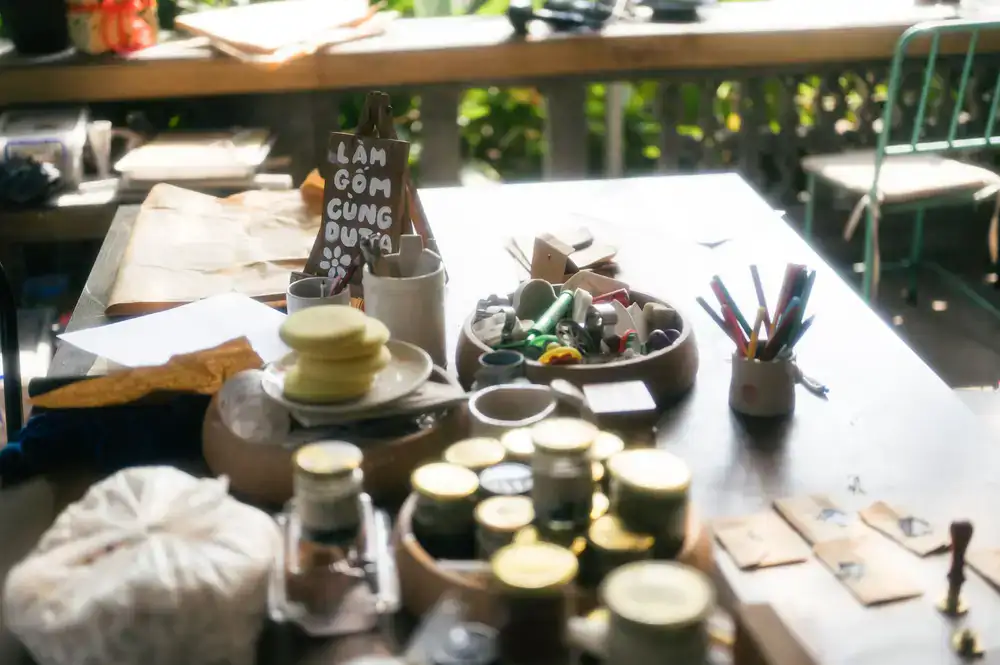Assortment of smooth handmade wooden toys on a sunny workshop table