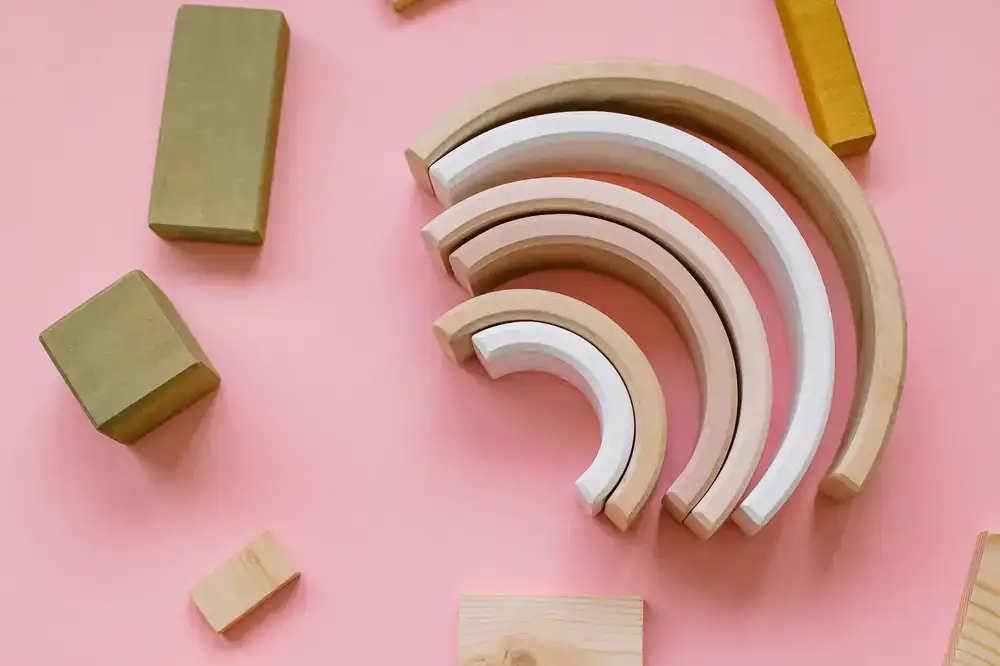 Set of smooth wooden building blocks in various shapes