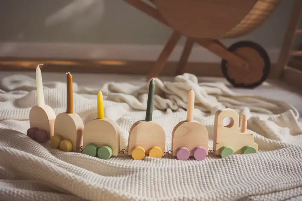 Wooden toy train spelling a child's name